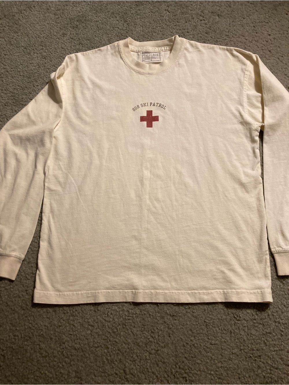 Woman’s Med. Cream Long-Sleeve Ski Patrol T-Shirt with Red Cross Graphic